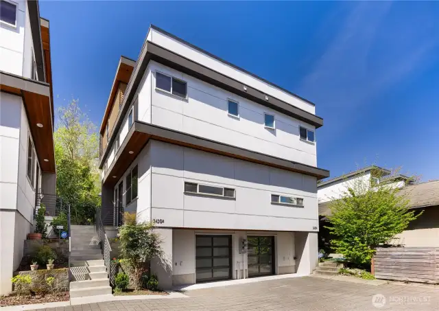 Rare to find end unit view townhome with oversized Garage, Yard, Rooftop, 2 primary ensuite, 3.5bath, and NO HOA!