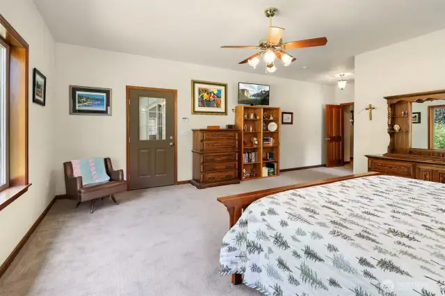 Complete with a walk-in closet and private bathroom, the Primary Suite also offers an exterior door leading out to the covered patio.