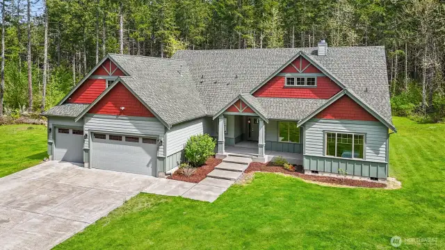 Three (plus) car garage providing even more parking / storage space. Plus concreted parking pad. Well-manicured, low maintenance landscaping. Pathway leads to the covered front entry.