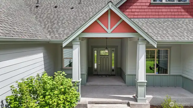 Large covered entryway welcomes you inside. The perfect spot for enjoying your morning coffee.