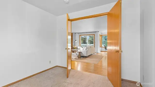 Doubled door to bonus room or den.
