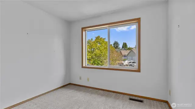 Bright and large 2nd upstairs bedroom.
