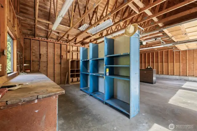 Shop with plenty of work space. Complete with compressor and 240V power.
