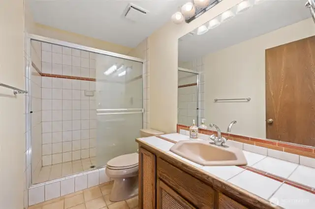 Main floor guest 3/4 bath. Possible ADU conversion.
