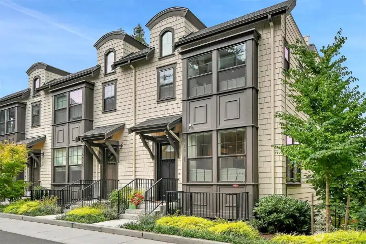 Toll Brothers do an excellent job on Craftsman detailing. This end unit has tons of extra light from north facing windows, so no glare.