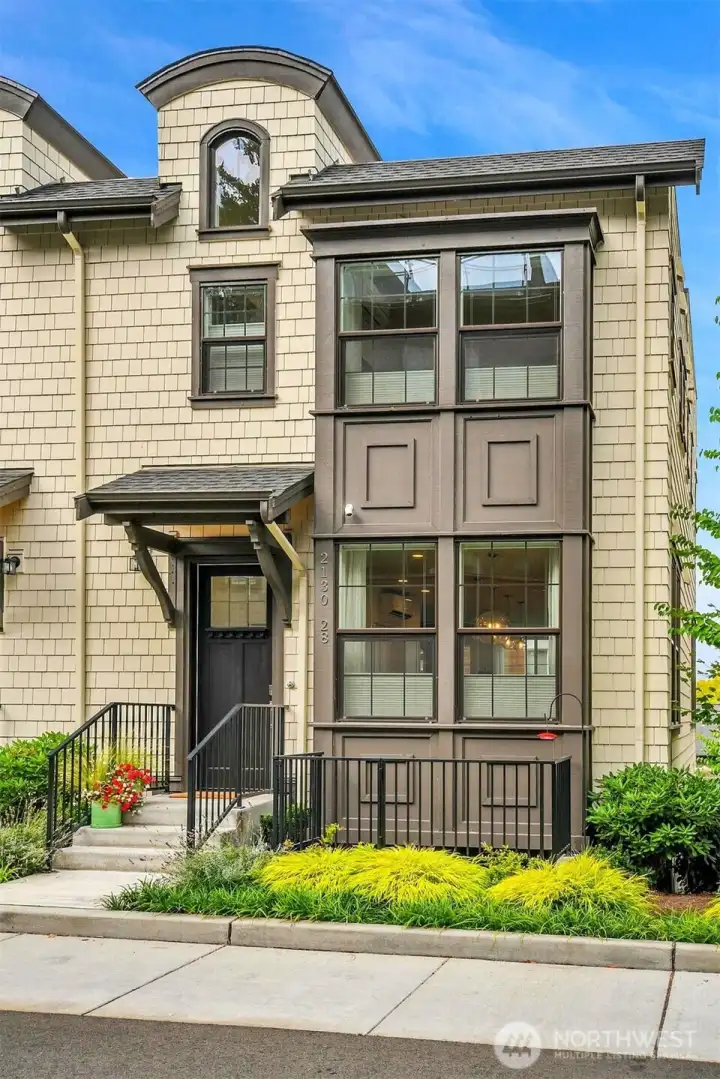 One of the coveted end units means 8 extra windows that the inside units dont have.