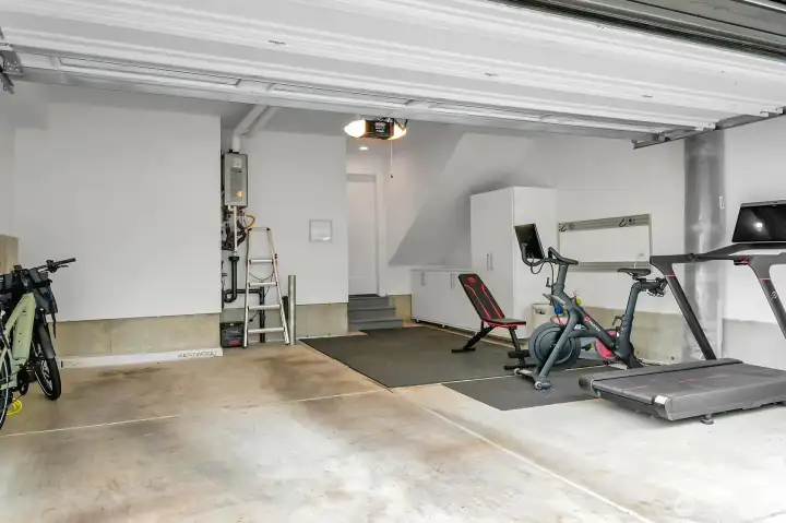 Roomy 2 car garage with car charger to left of frame here.