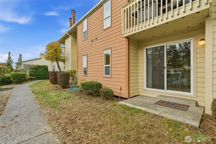 The rear patio has an additional storage area as well as the storage area in the carport.