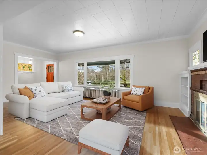 Gas fireplace. Leaded glass window accents.