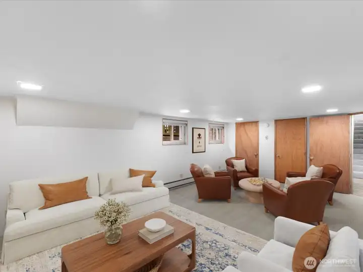 On the far end of the family room is a large closet w/ the water heater, etc.