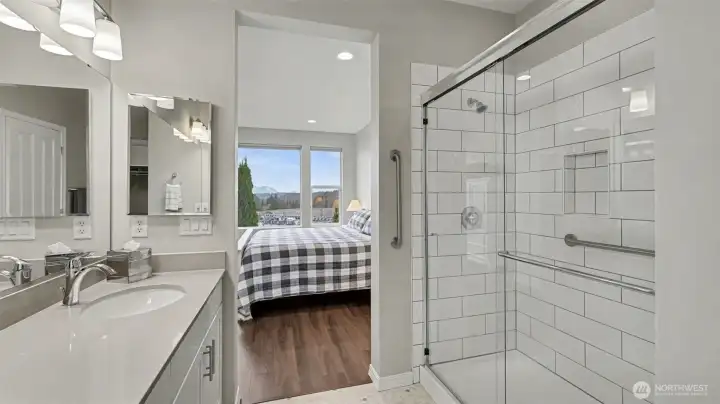 Luxury vinyl flooring in the primary bathroom with durability and style