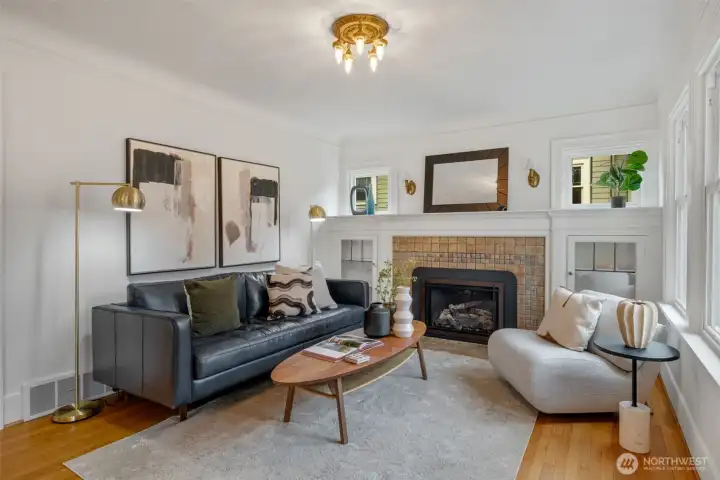 Living room with built-ins and gas FP