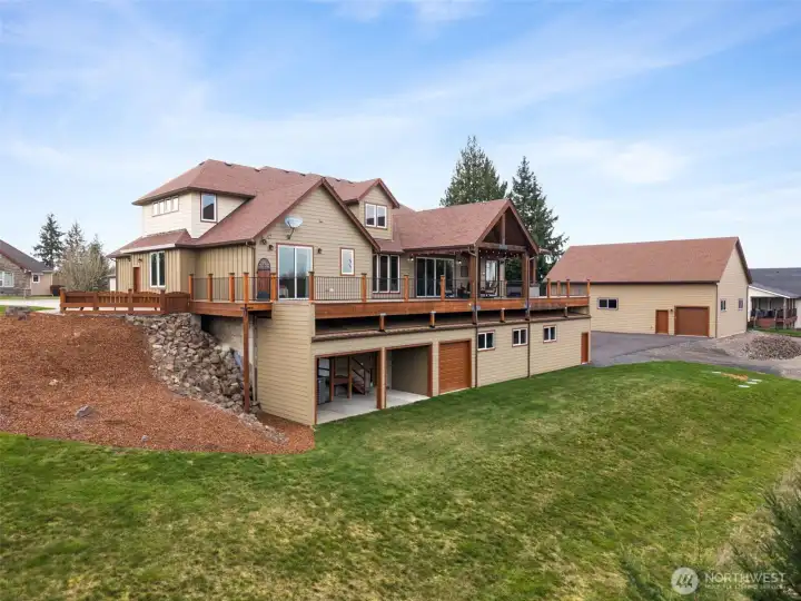 Rear View of home overlooking territorial and partial mountain view.