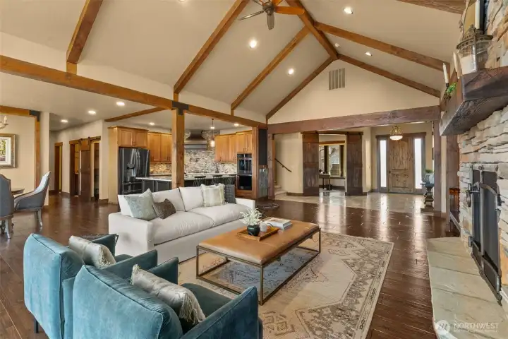 Vaulted ceilings with knotty alder beams.