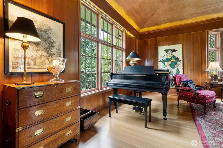 Expansive windows throughout beautifully frame the home’s architectural narrative, inviting natural light to highlight every thoughtfully designed detail.