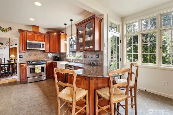 The kitchen that beams with sunshine, offers ample counterspace, and storage options.