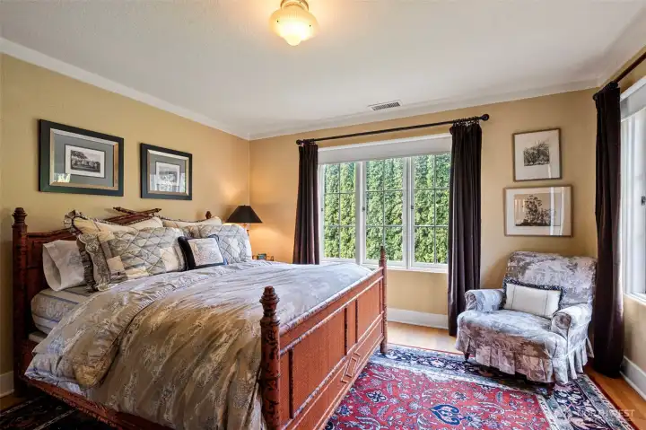 The second upper bedroom frames nature beautifully.