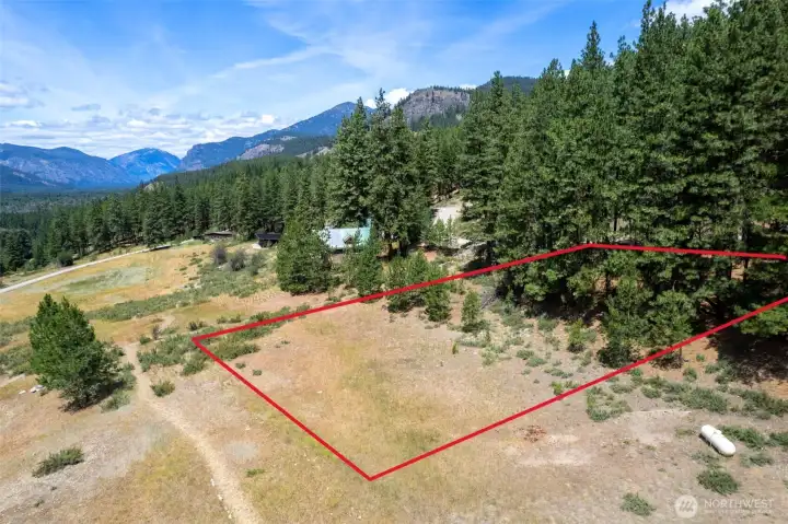 Gentle sloping hillside to tuck your home into.