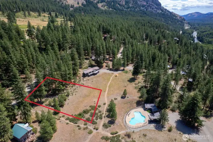 Community pool located across the meadow and the community access to the Methow River!