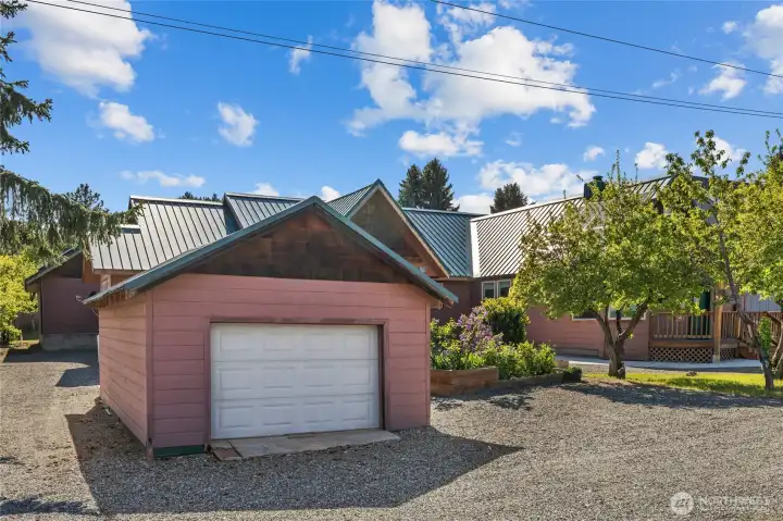 single car garage/shop with cherry and plum trees on the right single car garage/shop with cherry and plum trees on the right
