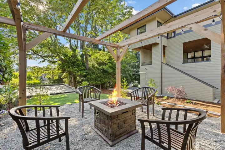 Pergola with propane fire pit too.