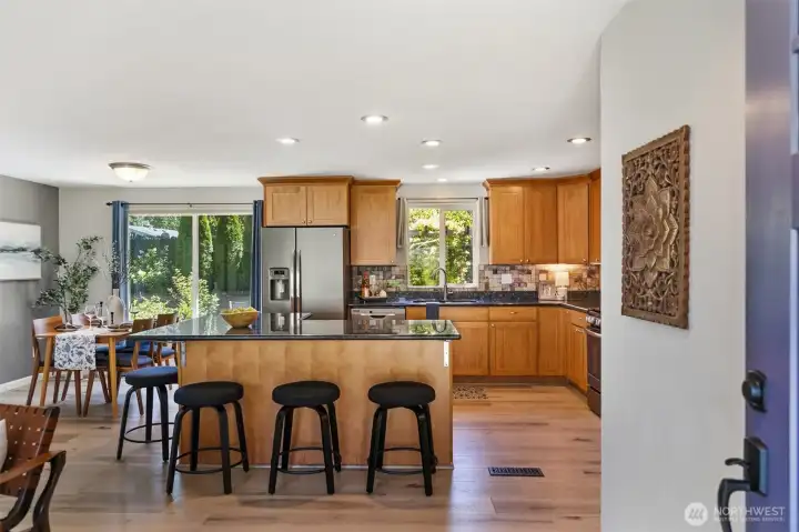 This kitchen functions with ease and shines with granite counters & beautiful plentiful cabinetry. This kitchen functions with ease and shines with granite counters & beautiful plentiful cabinetry.