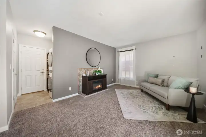 A extra bonus with this family room off kitchen and convenient to the partially fenced back yard. Enjoy the electric fireplace while relaxing. A extra bonus with this family room off kitchen and convenient to the partially fenced back yard. Enjoy the electric fireplace while relaxing.