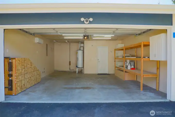 Owner formerly used garage for a wood shop. 220 added and also mini split for heating and cooling. Owner formerly used garage for a wood shop. 220 added and also mini split for heating and cooling.