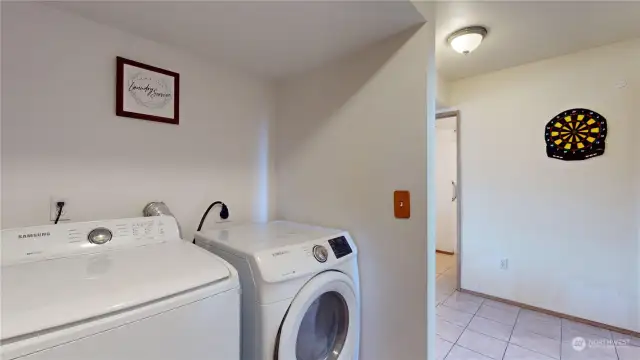 laundry area downstairs.  Next to tons of storage under the stairs