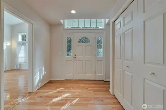 Formal entry, rich hardwood floors.