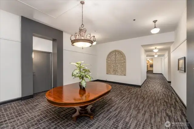 Fifth-Floor Hallway Leading to the Unit, Adorned with Elegant Furnishings