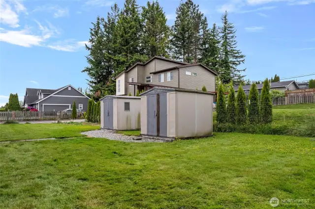 2 storage sheds in the back yard