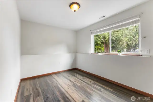 Downstairs 3rd bedroom is light filled but private
