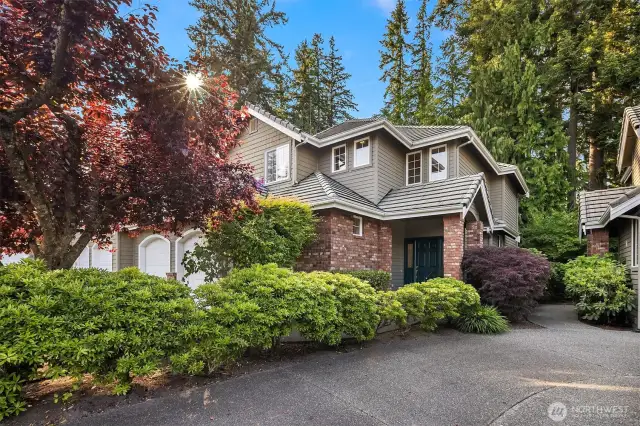 This exceptional end-unit townhome in 'The Masters' offers refined living in a highly sought-after community.
