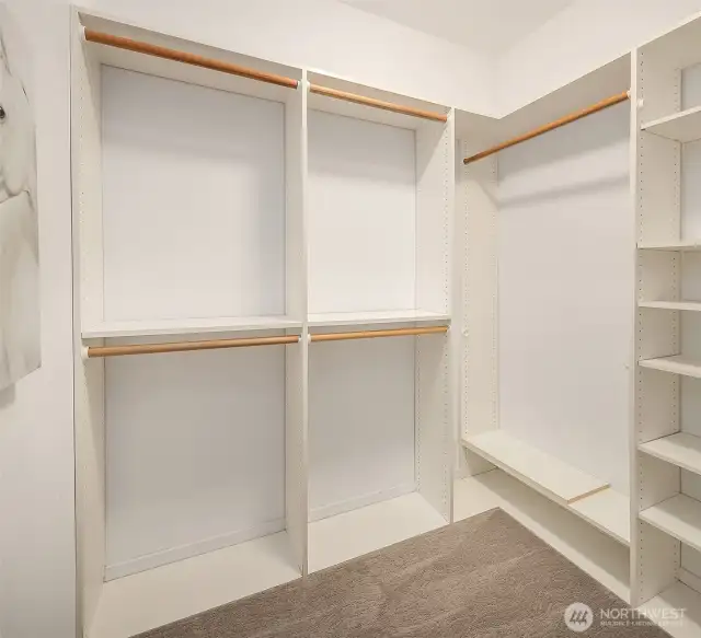 Primary walk-in closet with built-ins.