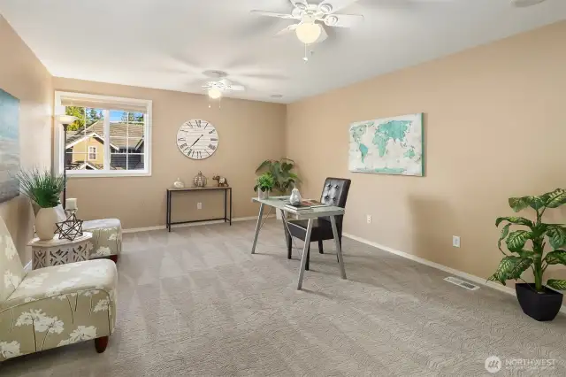 Upper level bonus room offers flexible options.