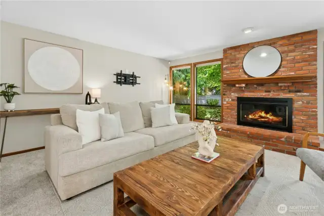 brick gas fireplace in family room