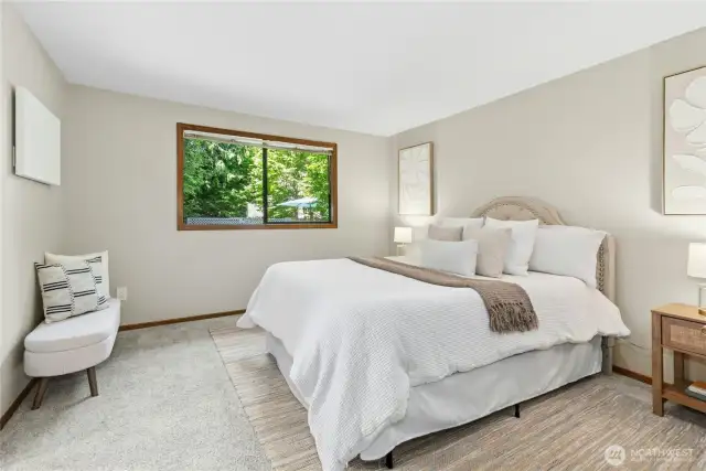 Main floor 2nd primary bedroom with ensuite
