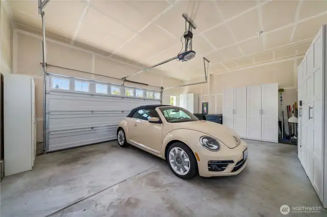 Oversized 2.5+ garage with tons of space for storage and a handy garage service door.