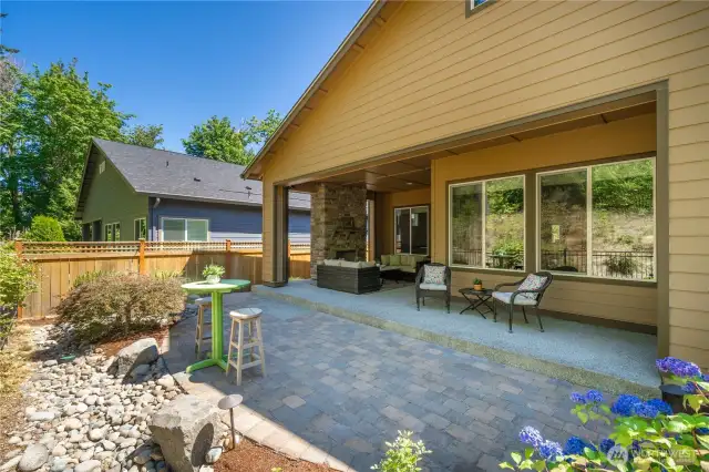 Two covered patios and extensive hardscape greatly expands your outdoor living space.