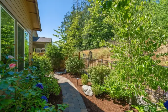 Beautifully landscaped with mature plantings all while being very low maintenance!
