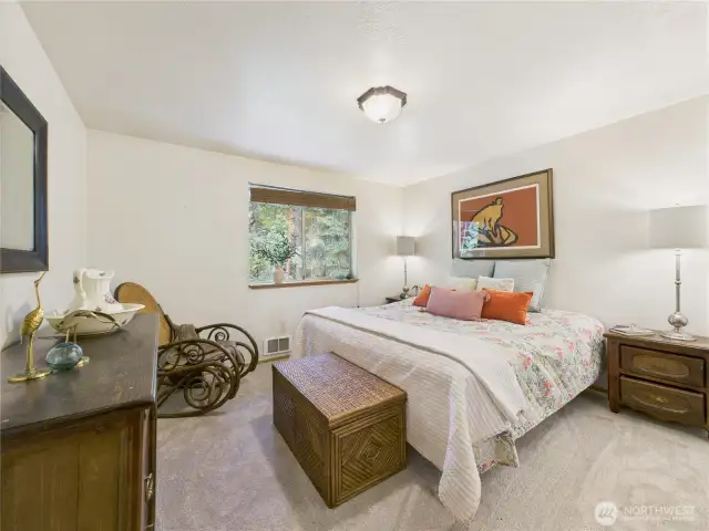 The largest bedroom (#2) has a view of the back yard. Wake up to the birdsong wafting through the air.