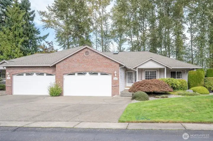 Experience easy one-level living in the desirable, gated community of Arabella - Elegant first impression.
