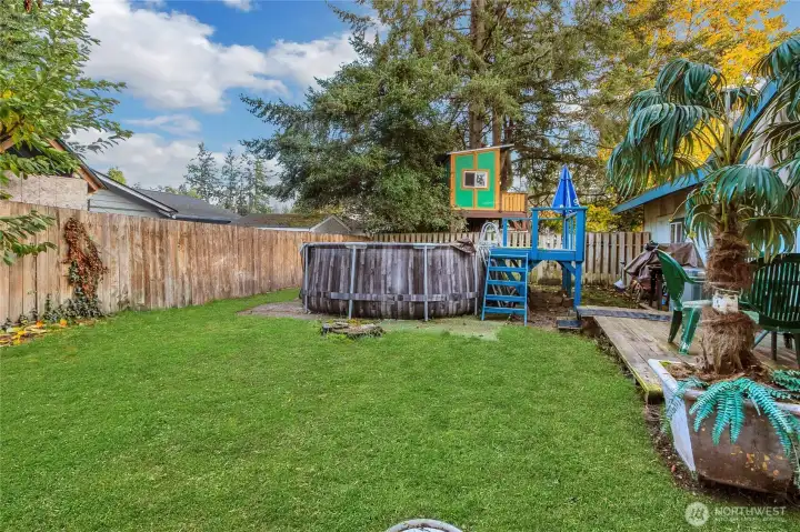 Backyard pool & deck. Great for entertaining!