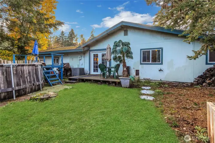 Backyard with deck off bedroom