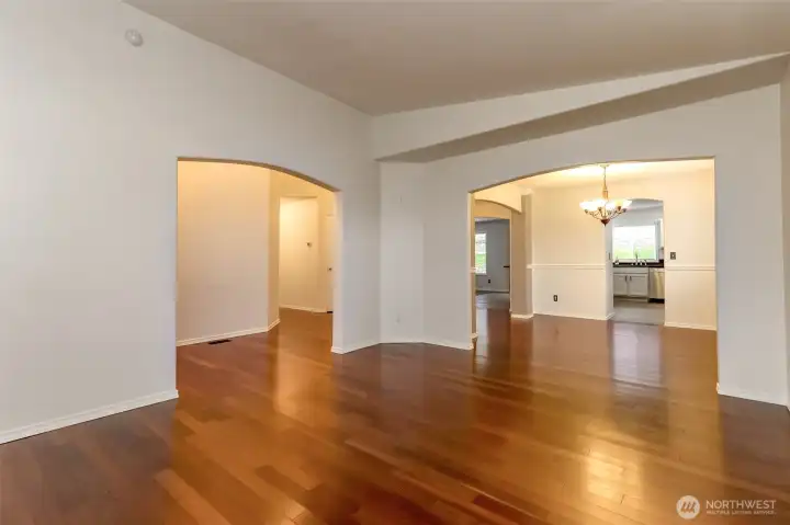 Living room looking towards entry to the left, dining room to the right