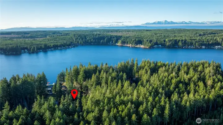 The beautiful Mason Lake. The home is located close to the private beach park.