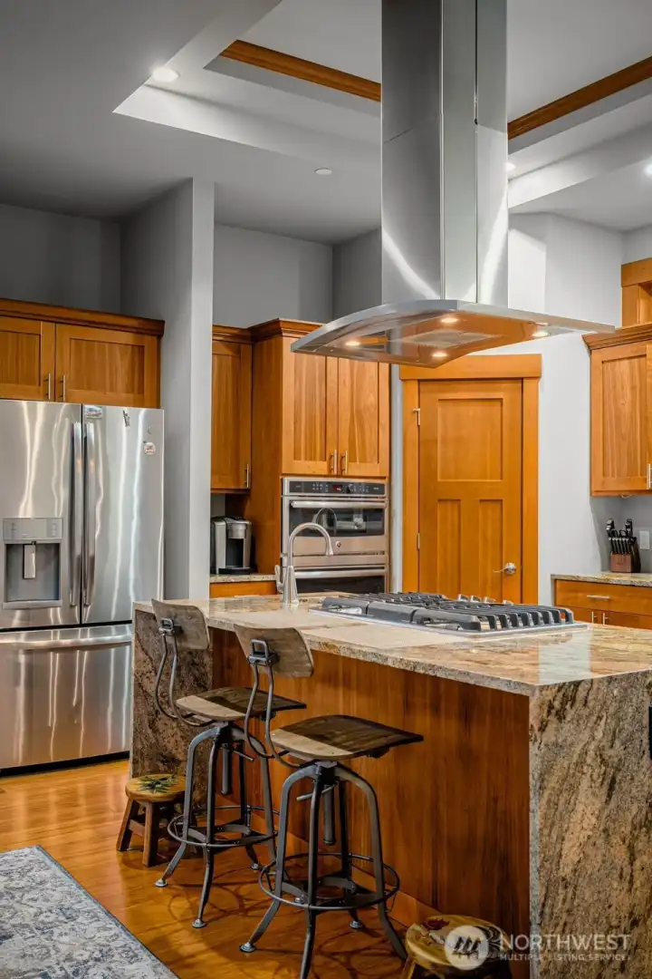 Breakfast bar seating and open flow to the great room.