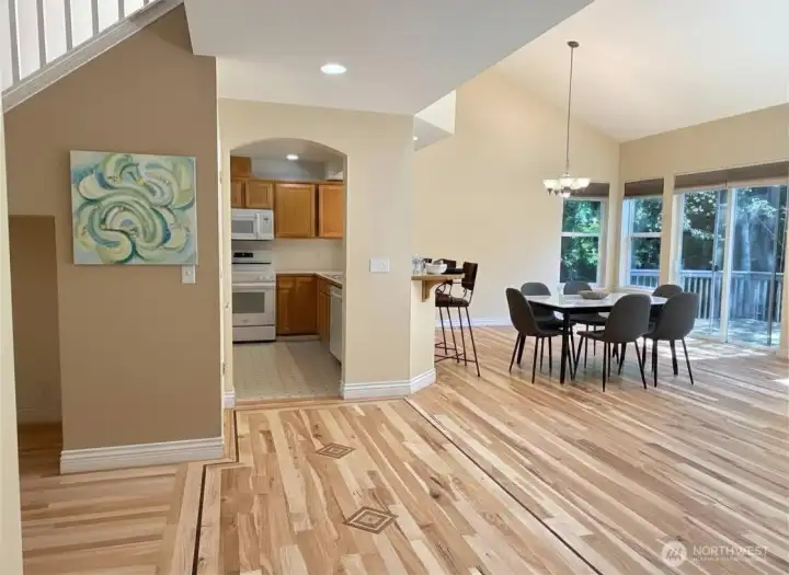 great layout with main floor dining, kitchen, living... and deck with a generous vault & light and airy feel. Virtually staged