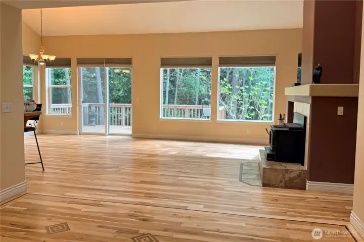 The owner just moved out & had the hardwood flooring refinished & it is amazing! Don't wait, you won't find floors like these anywhere else. Forgive how dark this photo is, my photographer was here before the floors were refinished, but I just had to show the gorgeous warm tones and how beautiful they were refinished. The home gets lots of natural light.